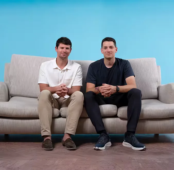 Giga Founders Brent and Matt seated on a couch